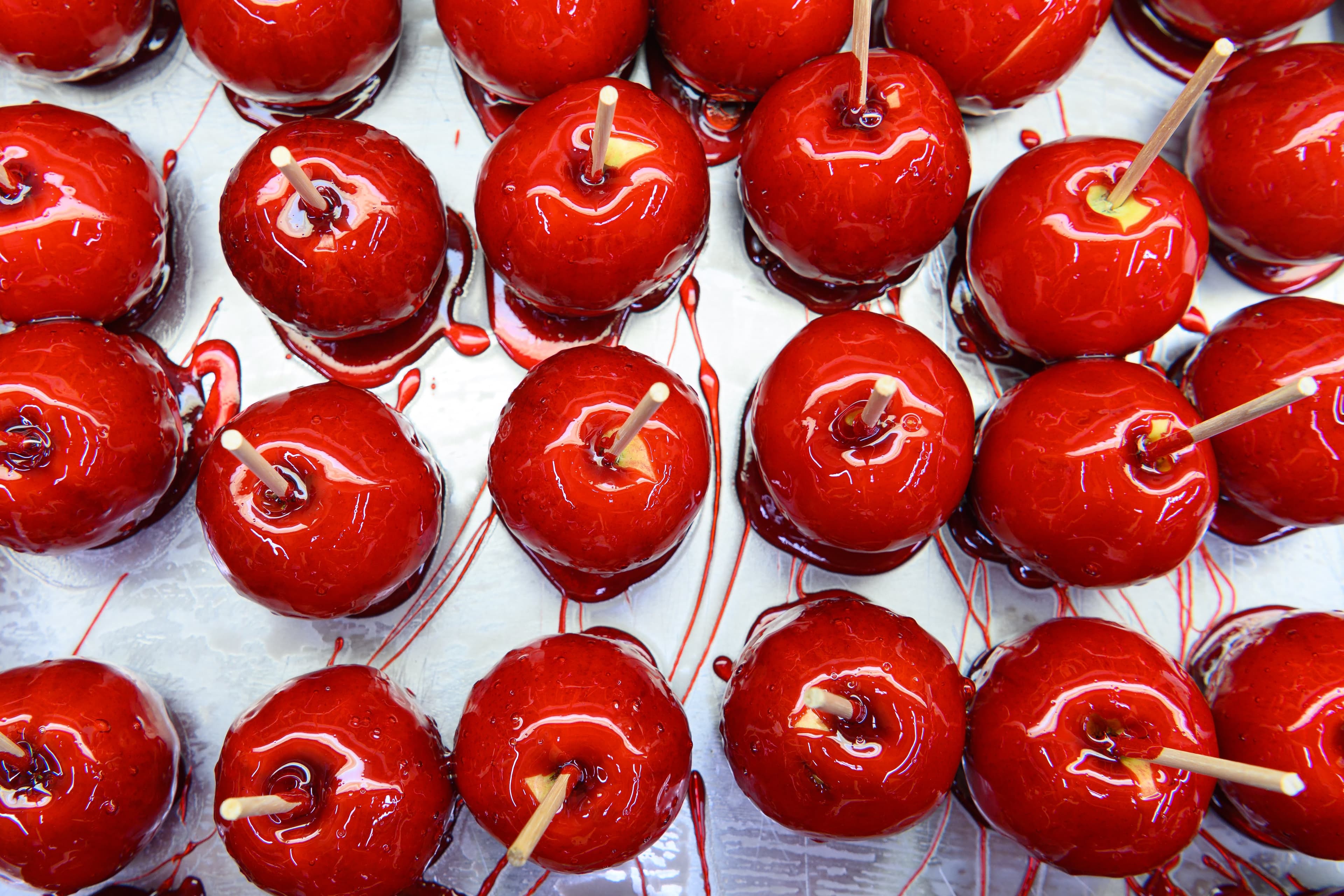 File photo: Red candy-coated apples are displayed on sticks. This archival image does not depict a new 2026 menu item.