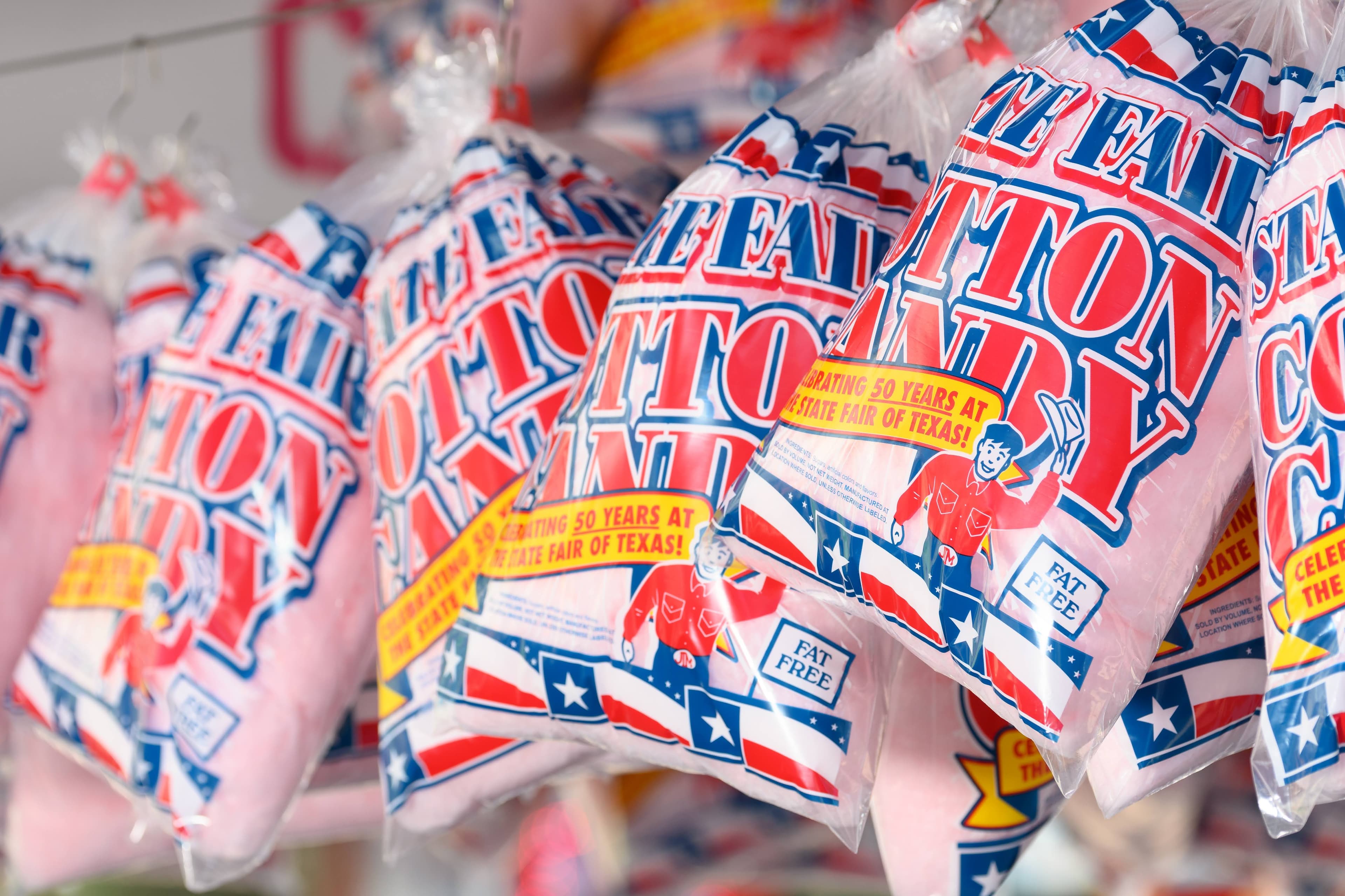 File photo: Bags of cotton candy carry State Fair of Texas labels. This archival image does not depict a new 2026 menu item.